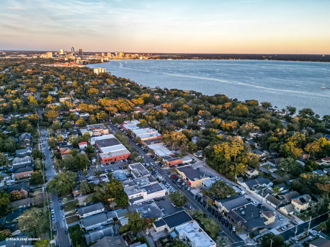 Aerial shot of downtown Jacksonville along the shoreline.