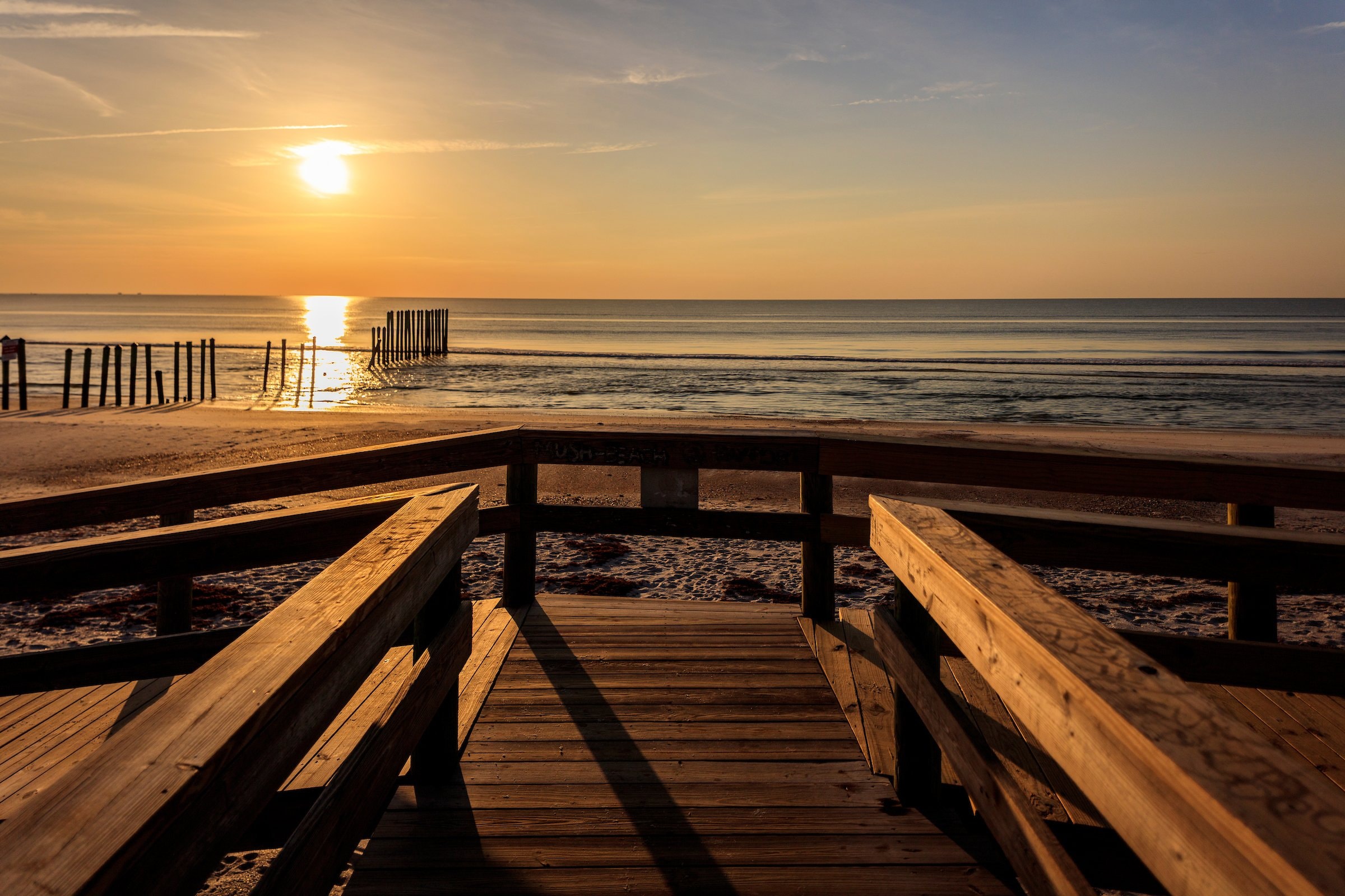 A sunset boardwalk view.